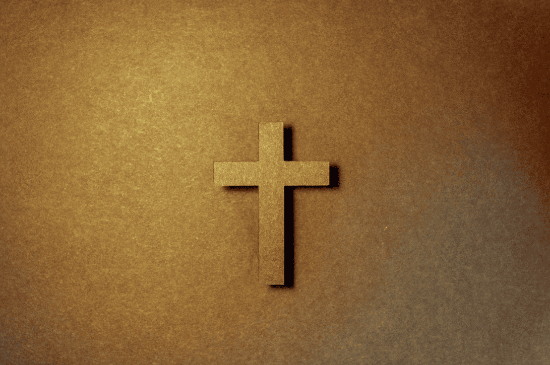 Cross by Kelly Sikkema on Unspash
